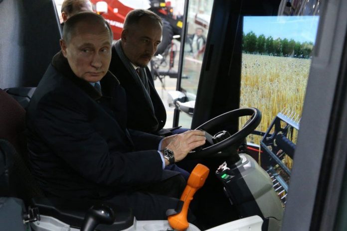 Vladimir Putin gets a tractor and two pyramids of melon for his 70th birthday (photos)