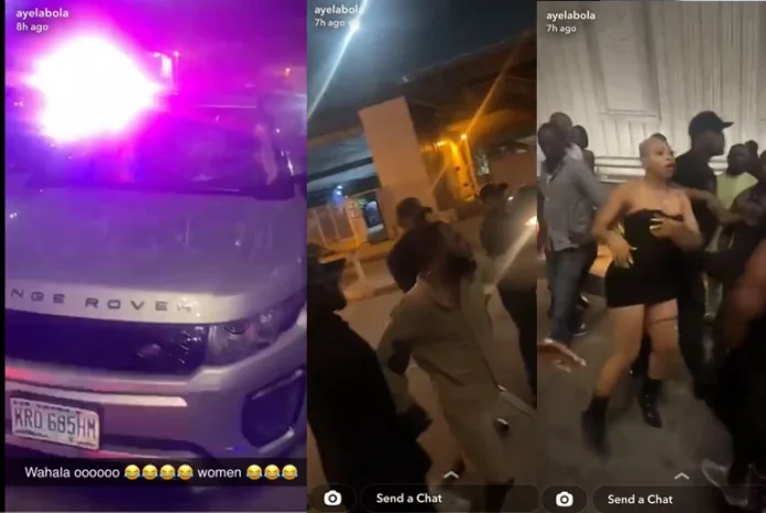 Married man destroys Range Rover he bought for his side chick at a popular nightclub in Ikoyi for 'cheating' on him (video)