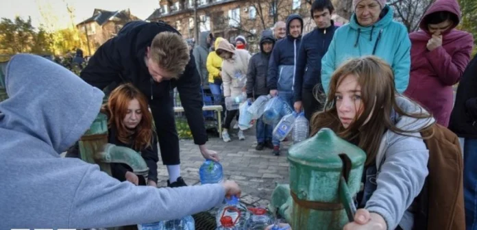 Ukraine war: Kyiv residents queue for water after Russian missile strikes (video)