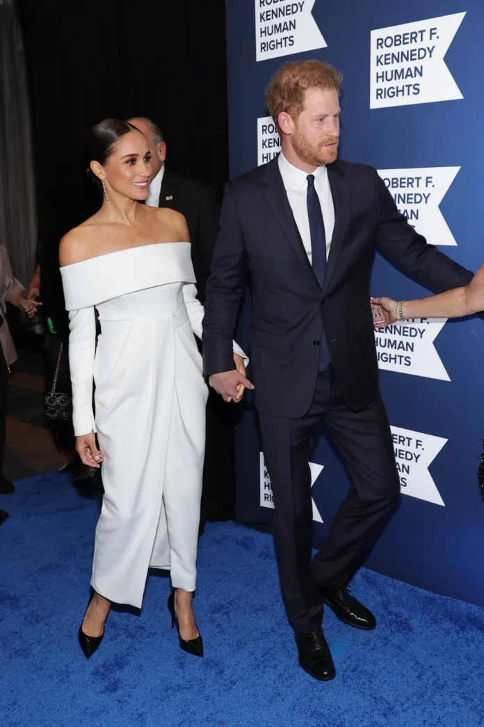 Meghan Markle And Prince Harry Clasp Hands As They Make Rare Red Carpet Appearance