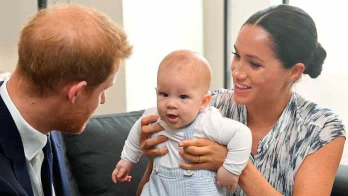 Prince Harry And Meghan's Son Prince Archie Walks Family Dog In Adorable Video