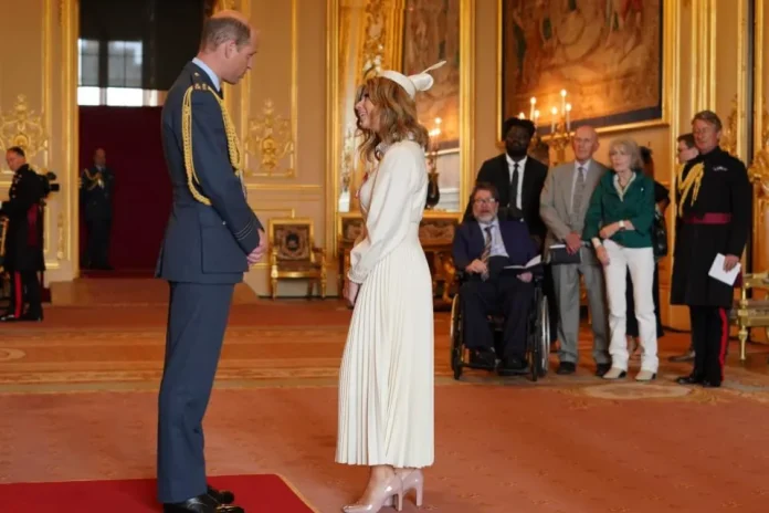 Kate Garraway Is Presented With MBE By Prince William