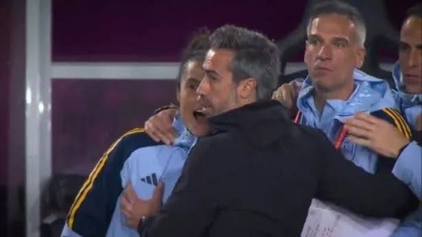 Spain coach Jorge Vilda appears TO GRAB female staff member's breast ...