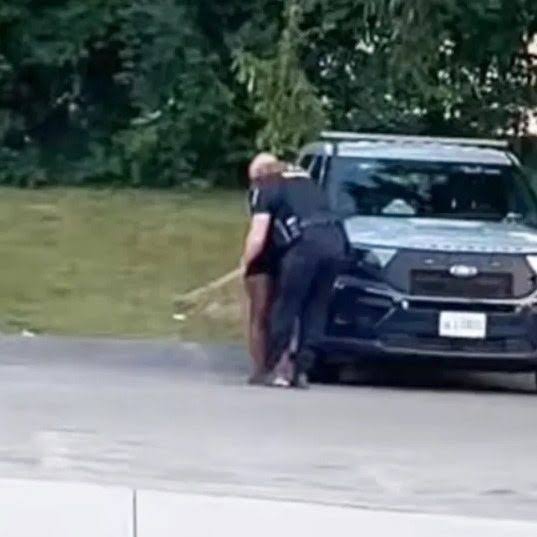 US police suspend officer CAUGHT kissing scantily clad woman before ...