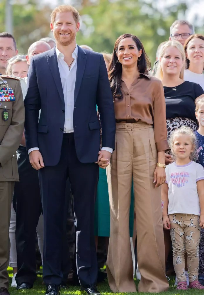 Meghan Markle And Prince Harry Hold Hands As They Appear For Last Day Of Invictus Games