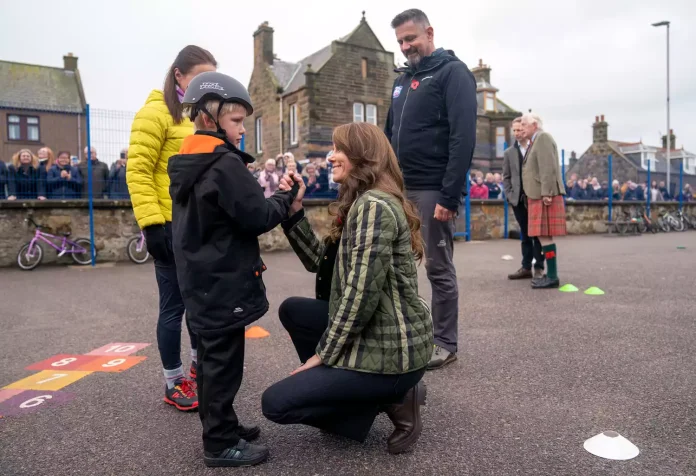 Kate Middleton Speeds Round A BMX Track, Consoles A Young Boy After He Falls Off His Bike And High Fives The Crowd On Trip To Scotland