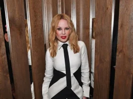 Kylie Minogue Is Stunning In Mini Dress With Surprising Accessory And Sheer Stockings