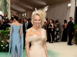 Pamela Anderson, Aged 56, Makes A Glamorous Appearance At The 2024 Met Gala In A Champagne Gown, Breaking Her Usual No-Makeup Rule