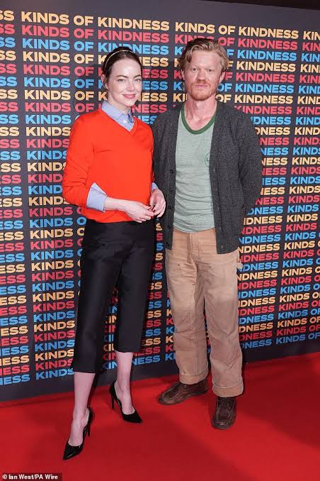 Emma Stone looks chic in a red jumper with co-star Jesse Plemons at the ...