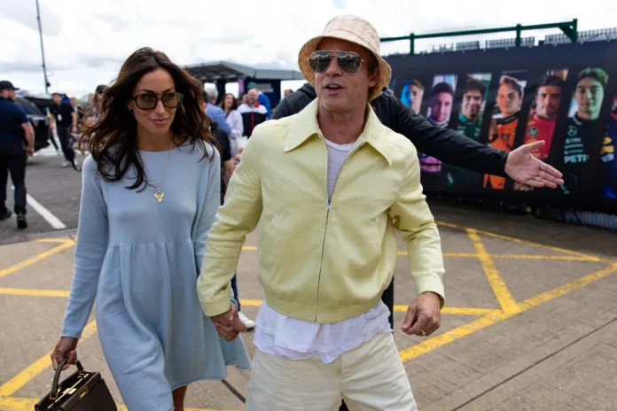 Brad Pitt And Girlfriend Ines De Ramon Hold Hands During Rare Public Outing At British Grand Prix