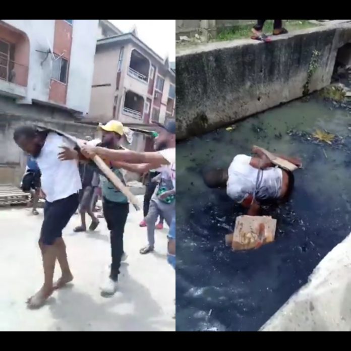 Video: Gay Man In Nigeria Was Tied Up And Beaten With Bottles And Planks Before Being Thrown In Gutter